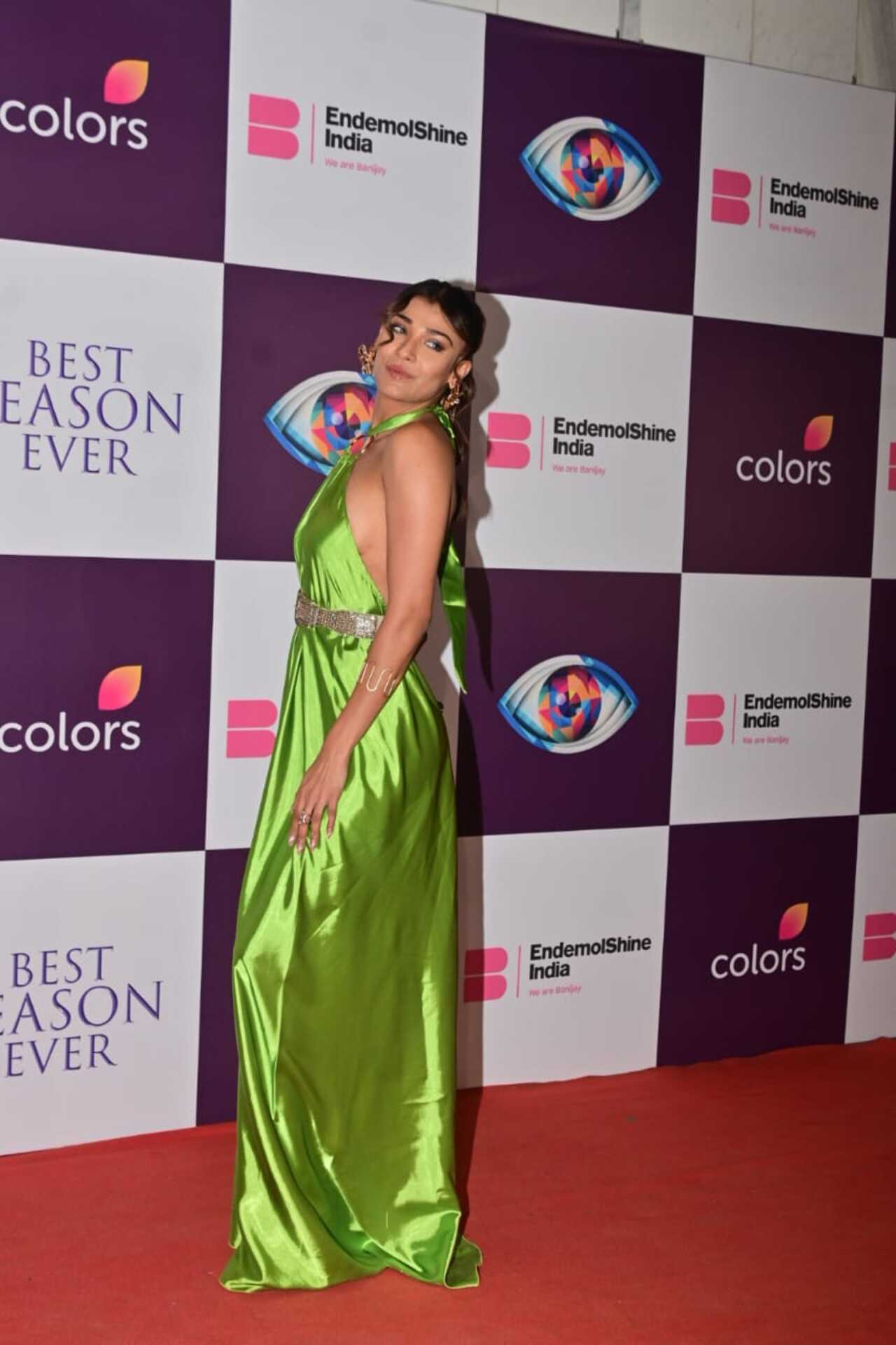 Nehal Chudasama opted for a green satin long dress for the bach. She amped up the glam quotient with her stunning avatar.